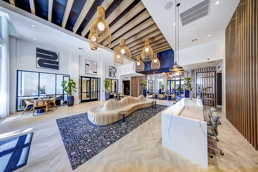 Spacious clubhouse and modern leasing office at The Ellsworth Apartments, perfect for community gatherings and resident services