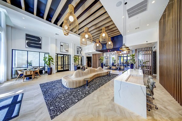 Spacious clubhouse and modern leasing office at The Ellsworth Apartments, perfect for community gatherings and resident services