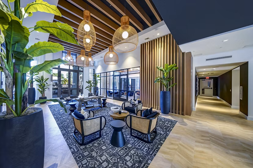 Ellsworth Apartments: Modern clubhouse featuring stylish lounge and community spaces