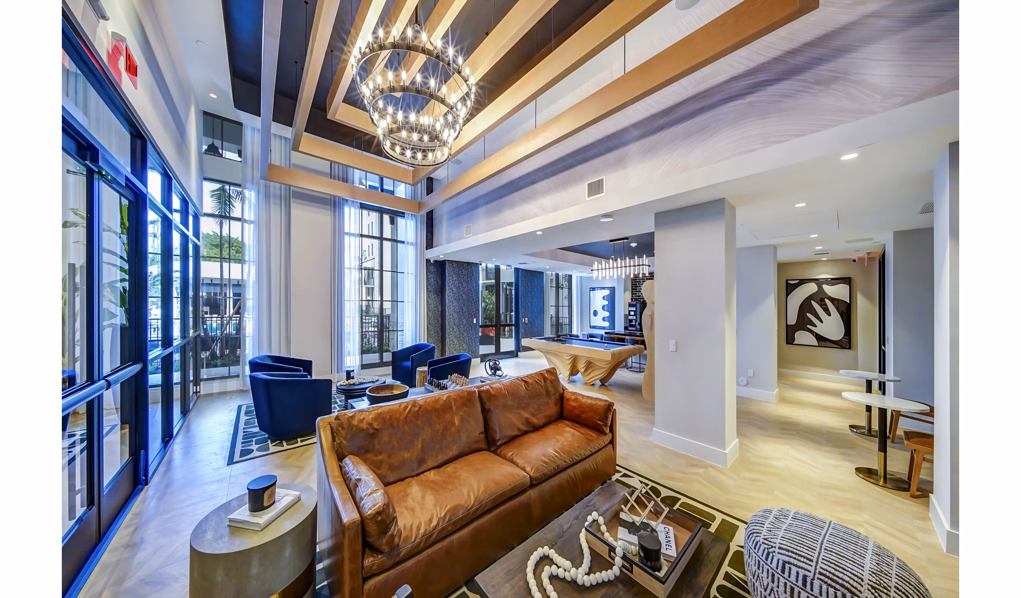 Clubhouse with elegant seating and modern decor at The Ellsworth Apartments, offering luxury amenities and a welcoming gathering space