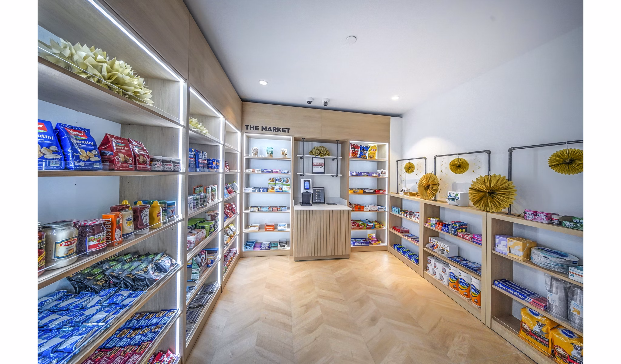 Clubhouse convenience store at The Ellsworth Apartments featuring everyday essentials in a modern setting