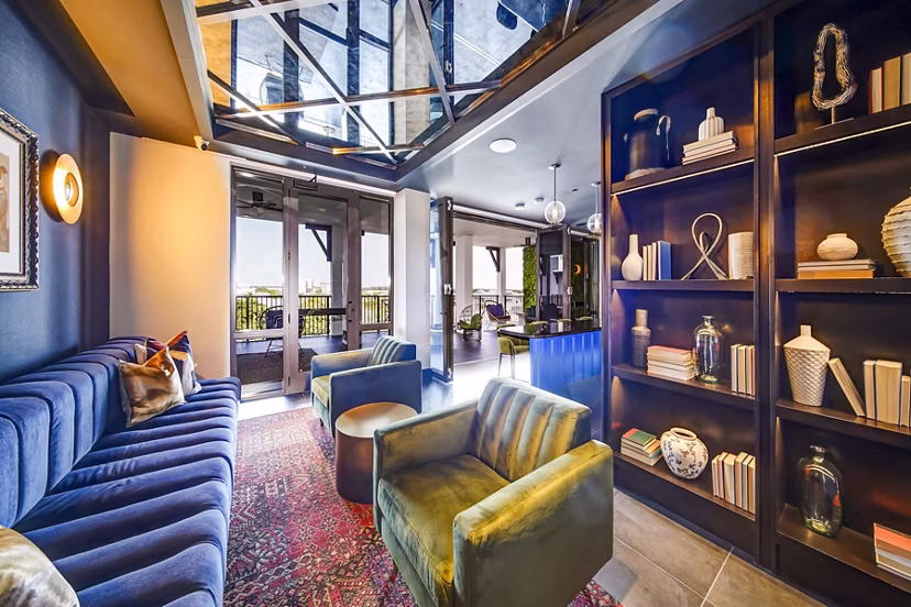 Inviting clubhouse with modern design elements at The Ellsworth Apartments, perfect for social gatherings and community events