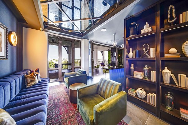 Inviting clubhouse with modern design elements at The Ellsworth Apartments, perfect for social gatherings and community events