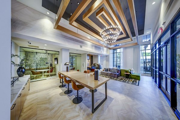 The Ellsworth Apartments: Clubhouse business center with modern meeting facilities, ideal for resident gatherings and coworking spaces