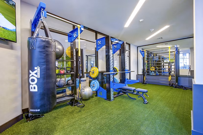 State-of-the-art fitness center with modern equipment at The Ellsworth Apartments