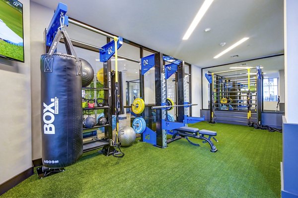 State-of-the-art fitness center with modern equipment at The Ellsworth Apartments