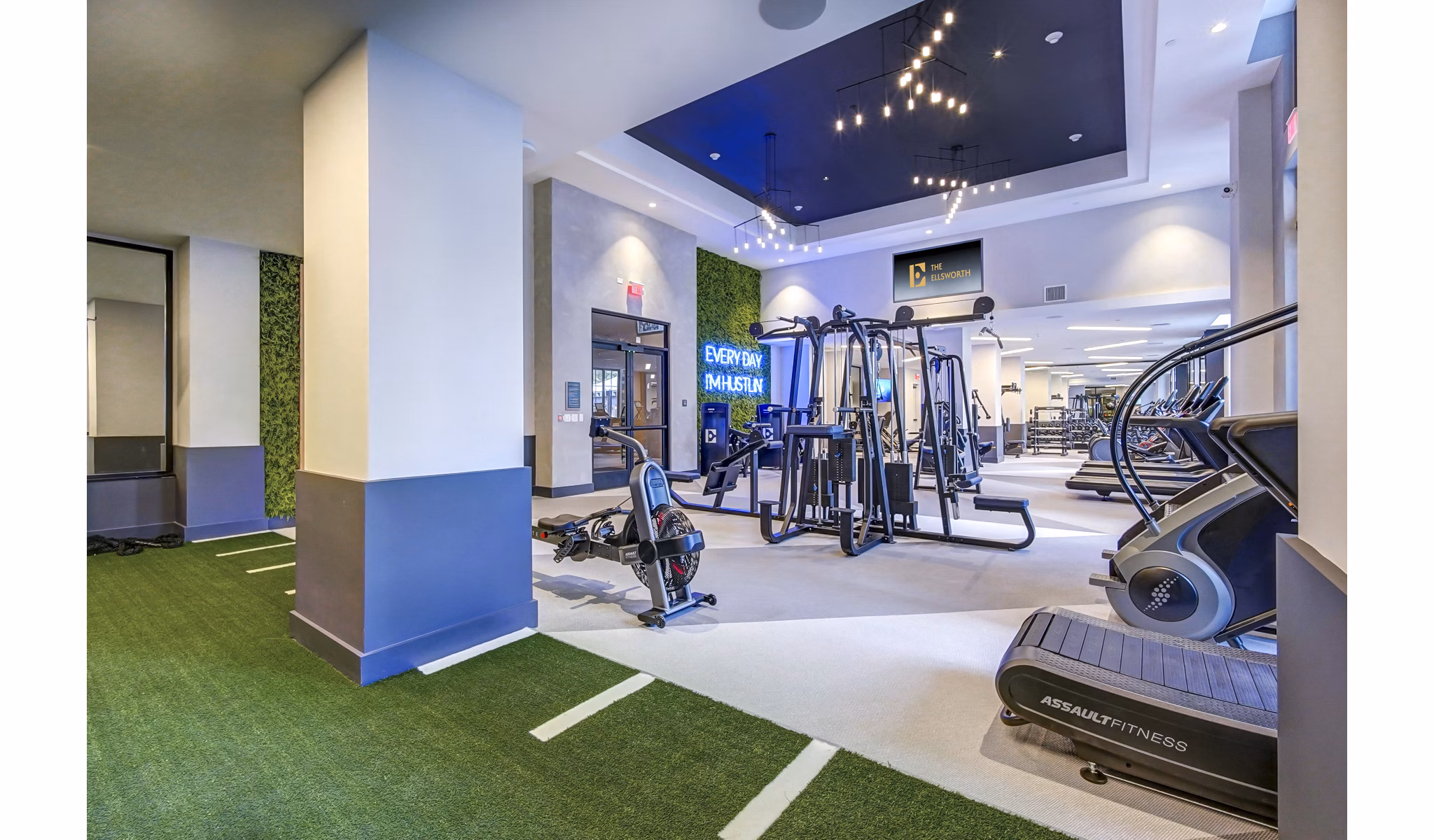 Modern fitness center with state-of-the-art equipment at The Ellsworth Apartments