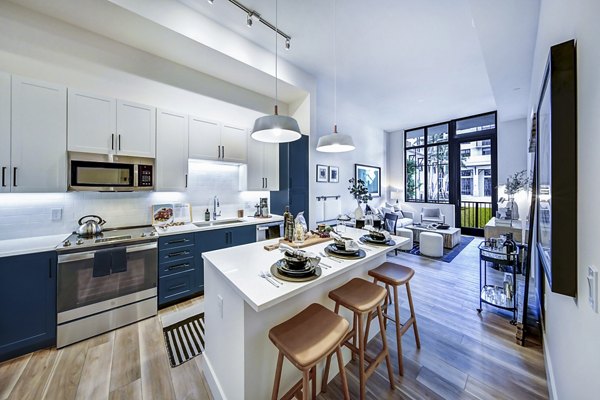 Spacious kitchen with modern appliances at The Ellsworth Apartments