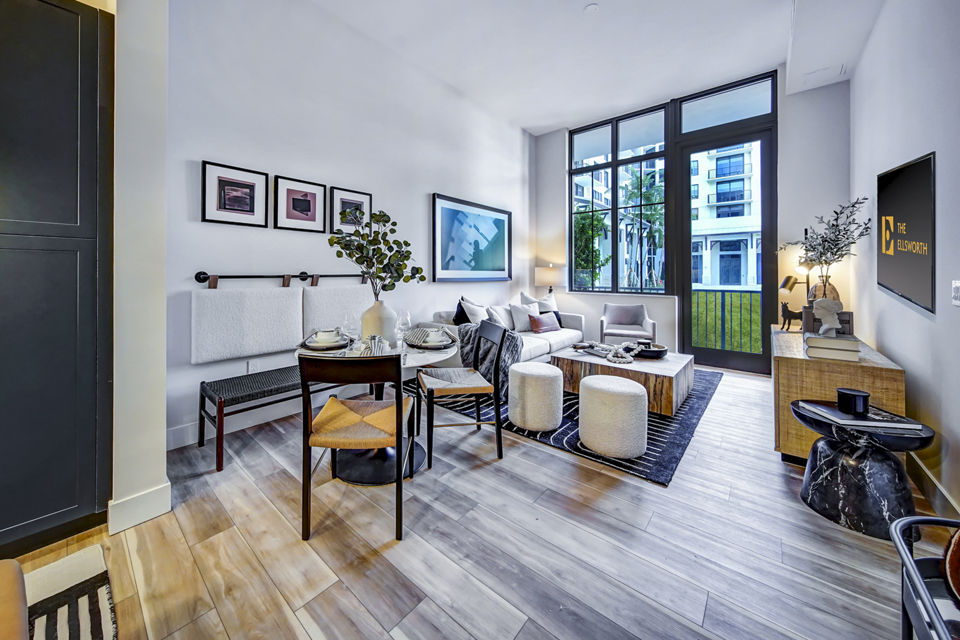 Spacious living room with modern decor at The Ellsworth Apartments, luxury rentals by Greystar