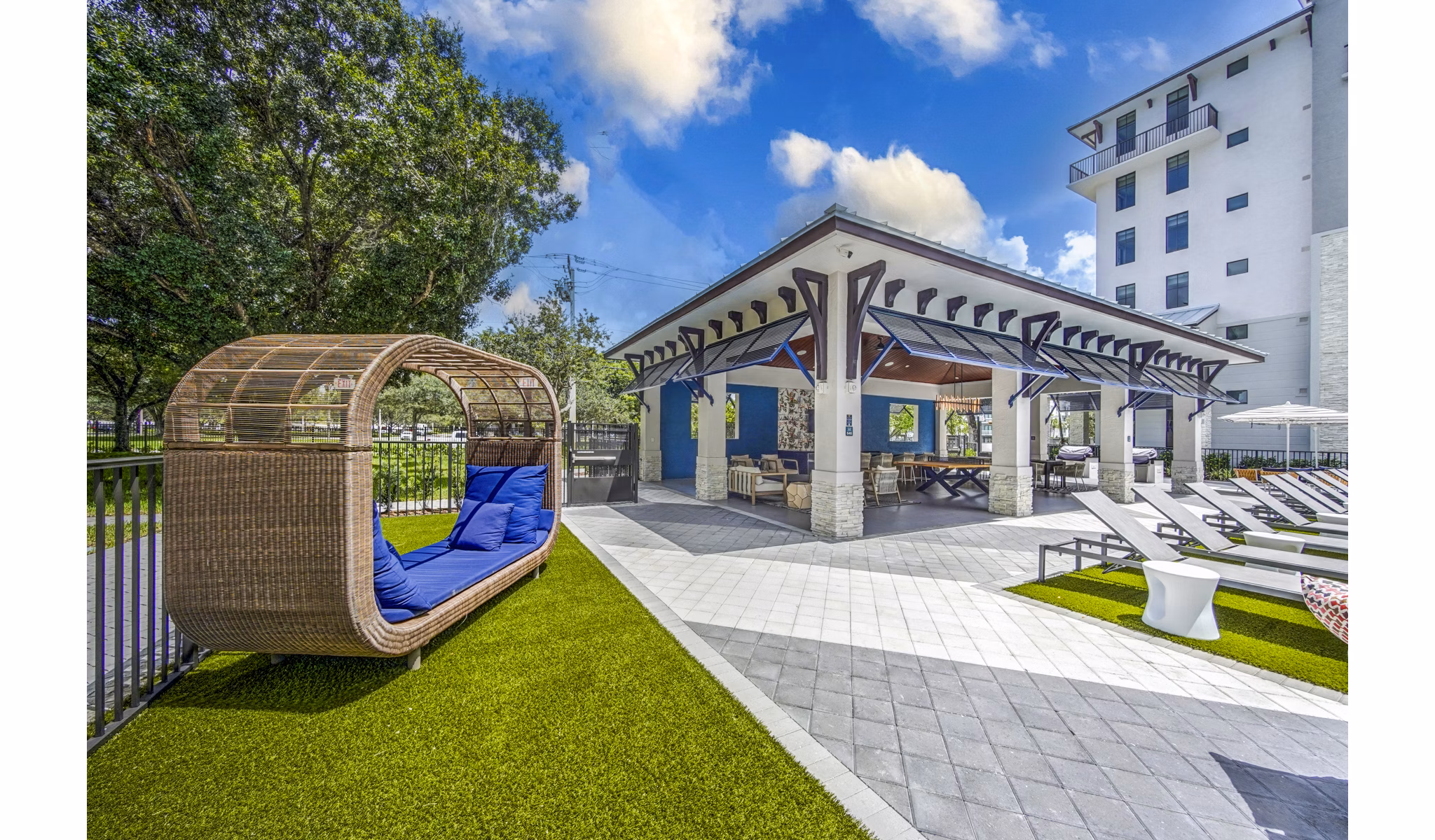Inviting grill area on spacious patio at The Ellsworth Apartments, perfect for outdoor cooking and socializing