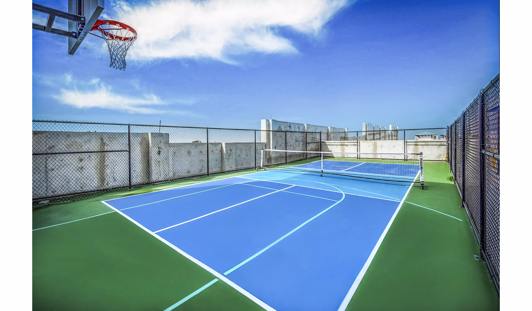 Outdoor tennis court at The Ellsworth Apartments available for residents and guests to enjoy competitive matches and recreational play