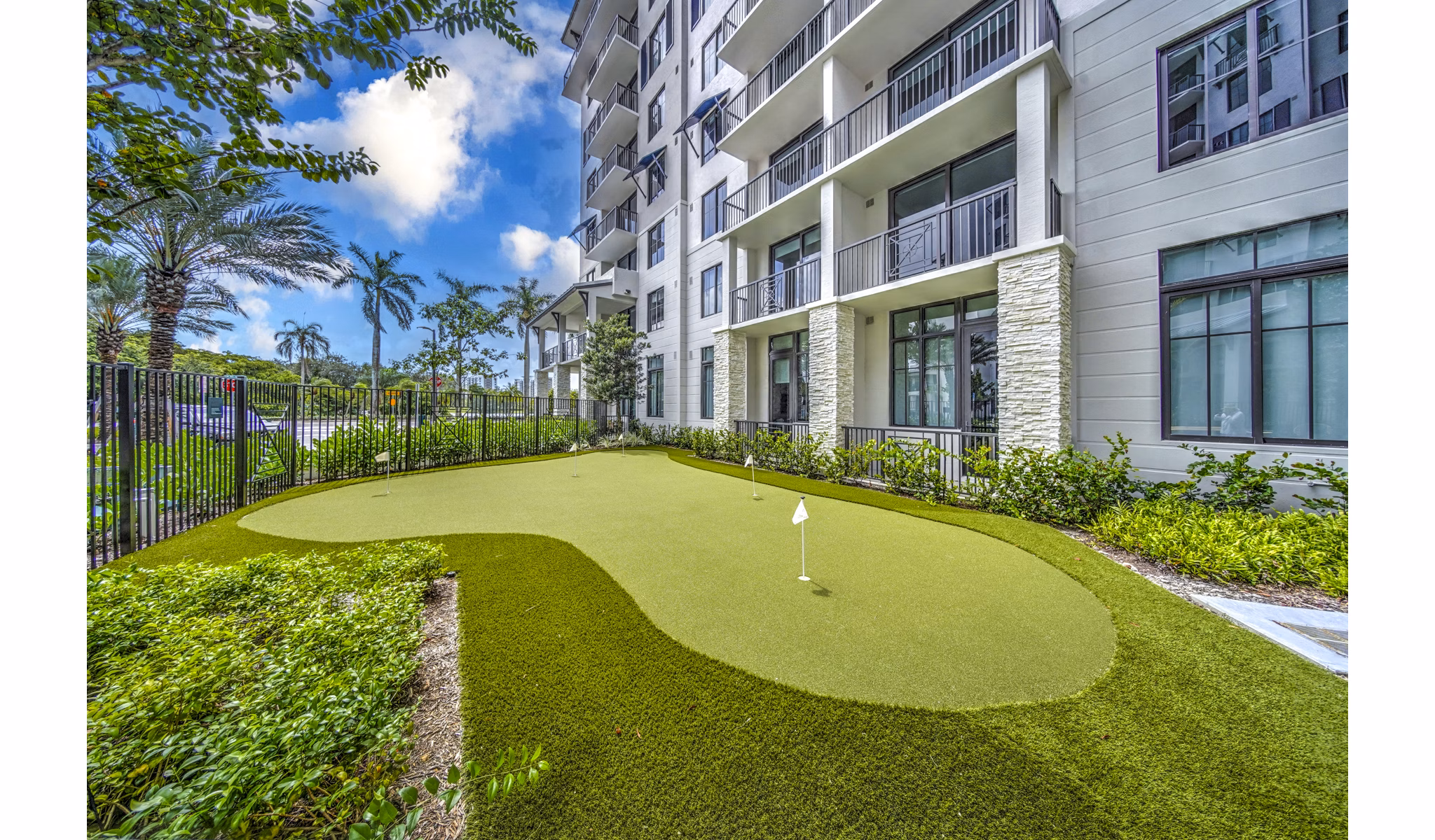 Putting green at The Ellsworth Apartments offering luxury recreation spaces for residents