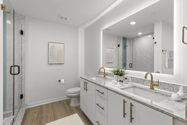 Bathroom featuring sleek fixtures and modern design in Ascent St Petersburg Apartments