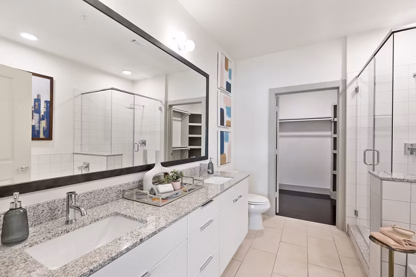 Elegant bathroom with modern fixtures at The Oliver Apartments
