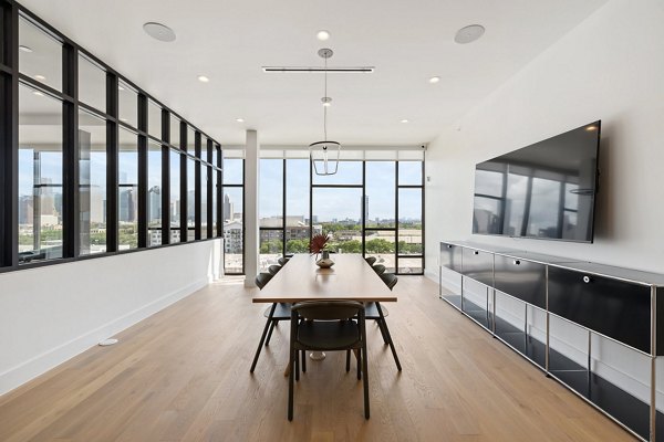 Clubhouse featuring modern design and seating at The Oliver Apartments