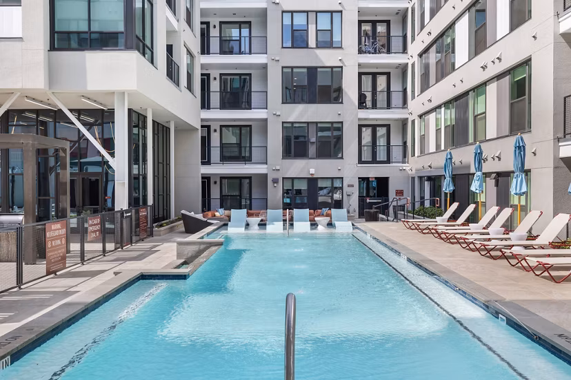 Rooftop pool with city views at The Oliver Apartments, a luxury Greystar community