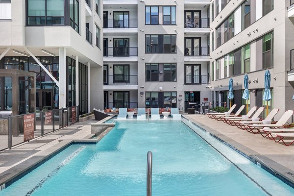 Rooftop pool with city views at The Oliver Apartments, a luxury Greystar community