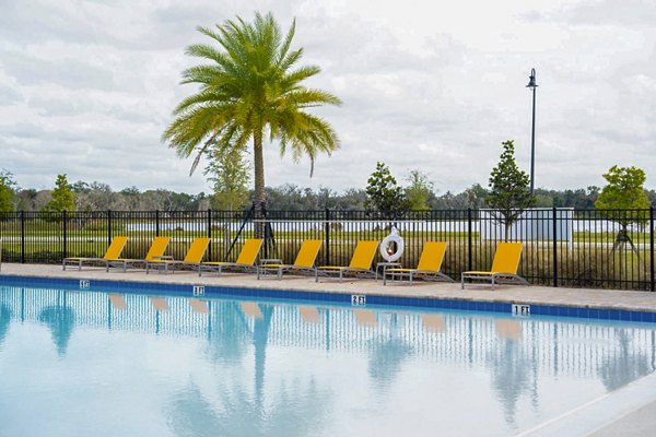 Sparkling outdoor pool at Summerwell Avian Pointe Apartments for luxury relaxation