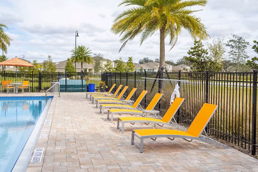 Luxurious outdoor pool at Summerwell Avian Pointe Apartments, perfect for relaxation and leisure activities