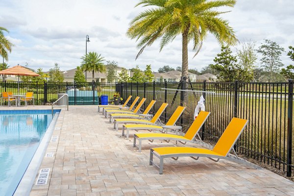 Luxurious outdoor pool at Summerwell Avian Pointe Apartments, perfect for relaxation and leisure activities
