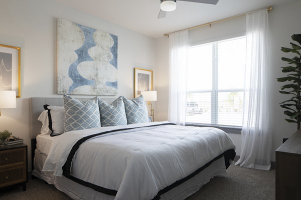 Luxurious bedroom with elegant furnishings at Broadstone Bryson Apartments