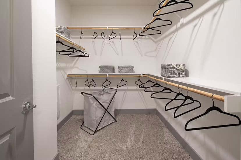 Walk-in closet with ample shelving at Broadstone Bryson Apartments