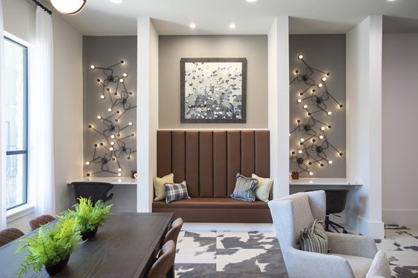 Clubhouse featuring modern seating and entertainment areas at Broadstone Bryson Apartments