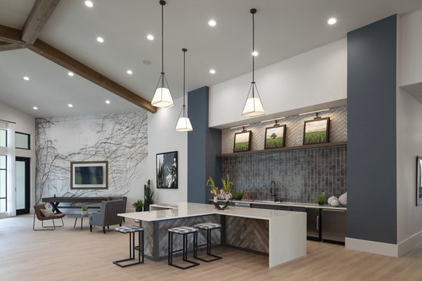 Clubhouse featuring modern design and cozy seating areas at Broadstone Bryson Apartments