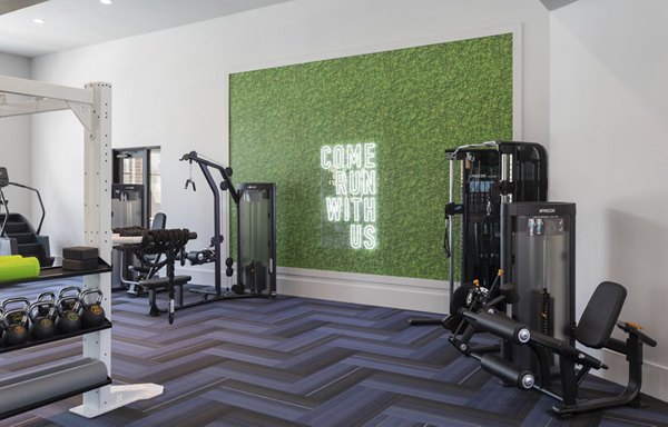 State-of-the-art fitness center at Broadstone Bryson Apartments featuring modern equipment and spacious workout areas for residents