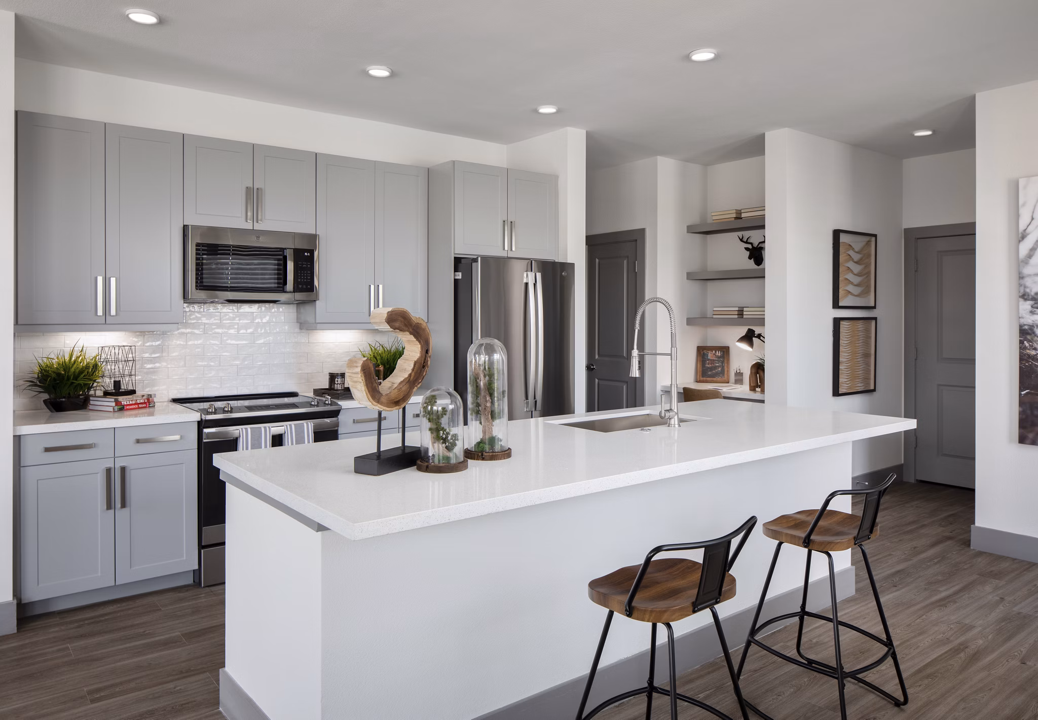 Modern kitchen featuring sleek countertops and stainless steel appliances at Broadstone Bryson Apartments