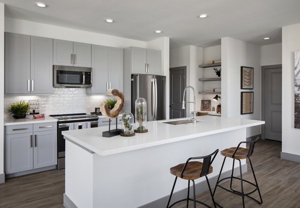 Modern kitchen featuring sleek countertops and stainless steel appliances at Broadstone Bryson Apartments