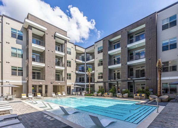 Luxury apartments with a refreshing swimming pool in the landscaped courtyard