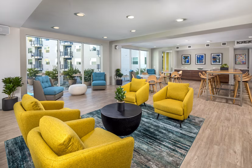 Clubhouse featuring cozy seating and modern decor at Aston at Gateway Apartments