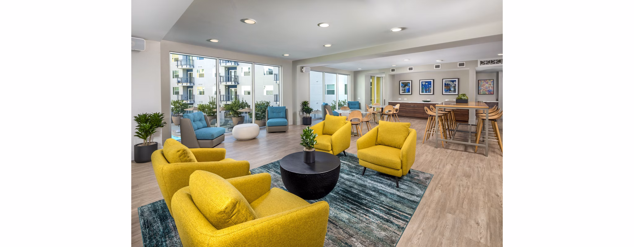 Clubhouse featuring cozy seating and modern decor at Aston at Gateway Apartments