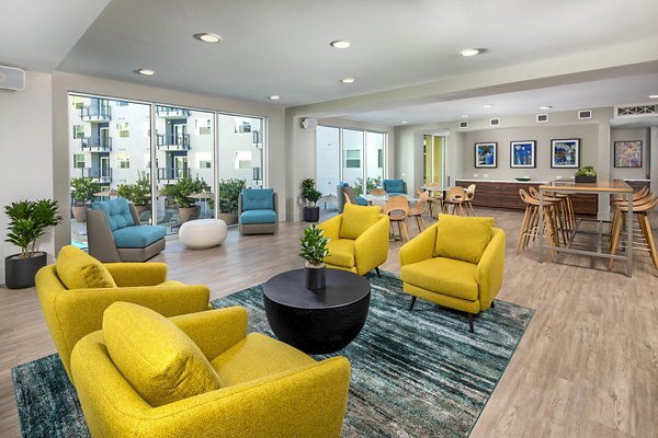 Clubhouse featuring cozy seating and modern decor at Aston at Gateway Apartments