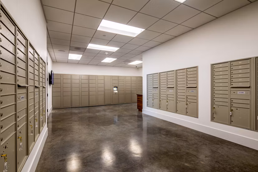 Mailroom with secure package lockers at Aston at Gateway Apartments