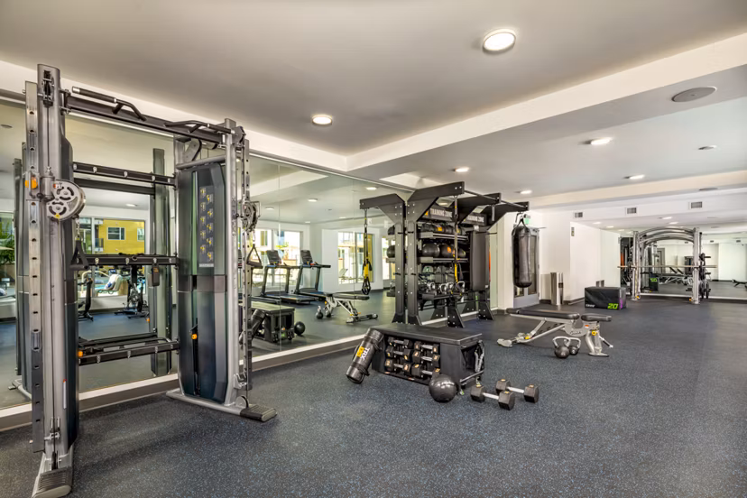 Modern fitness center with state-of-the-art equipment at Aston at Gateway Apartments