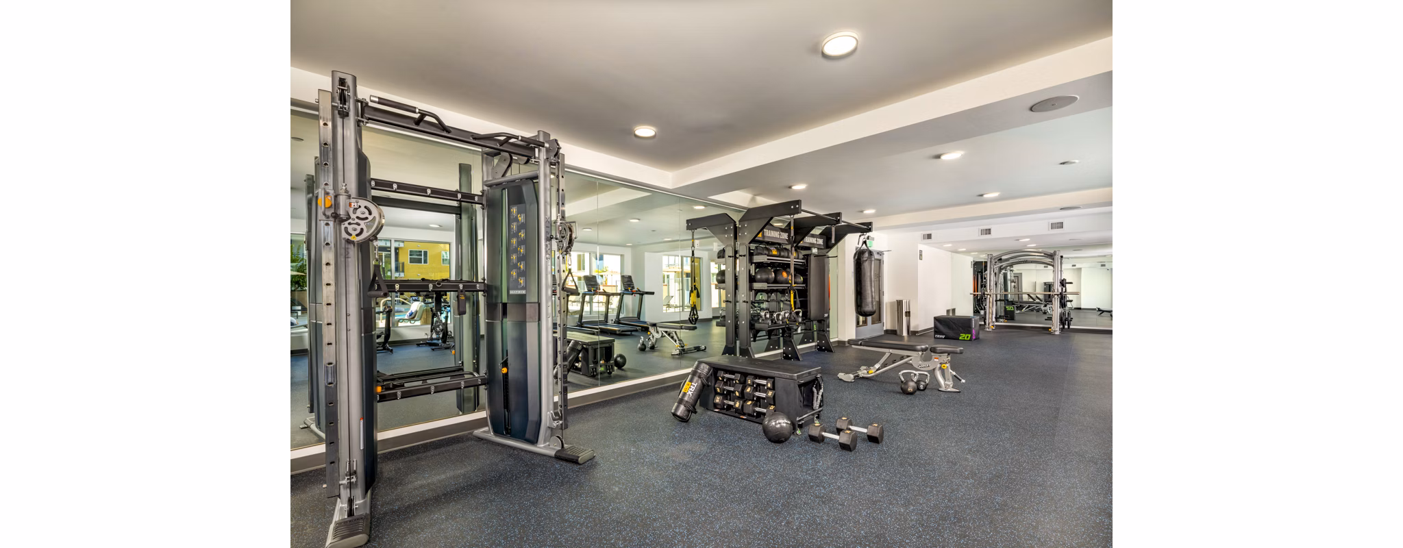 Modern fitness center with state-of-the-art equipment at Aston at Gateway Apartments