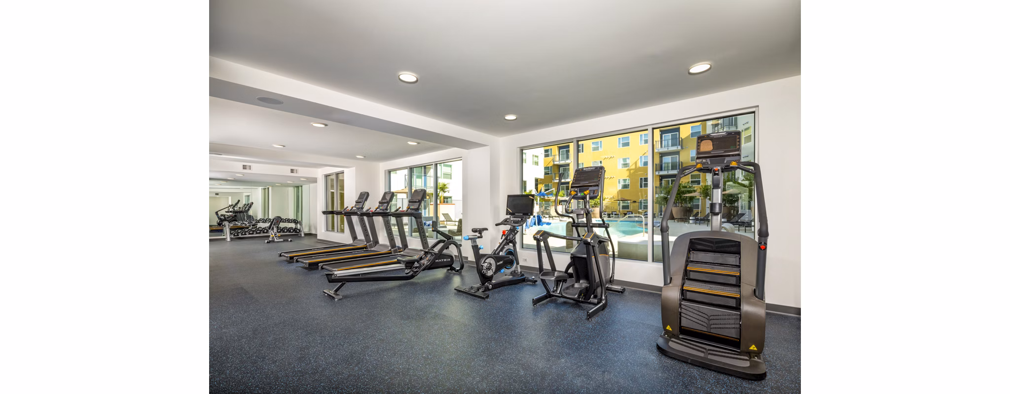 Fitness center with modern equipment at Aston at Gateway Apartments