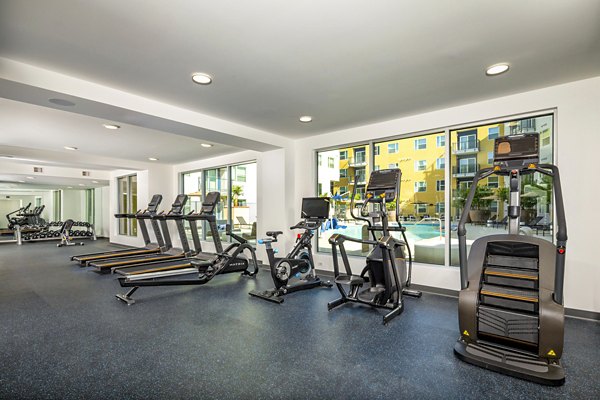 Fitness center with modern equipment at Aston at Gateway Apartments