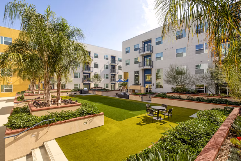 Fire pit on cozy patio at Aston at Gateway Apartments, perfect for luxury outdoor relaxation