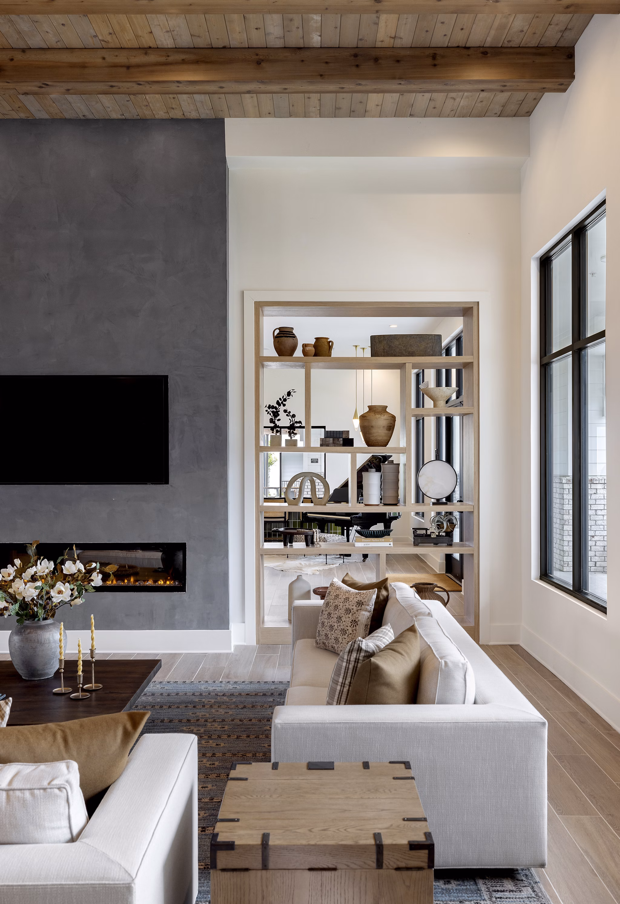 Contemporary clubhouse with lounge seating at Maxwell Apartments for social gatherings