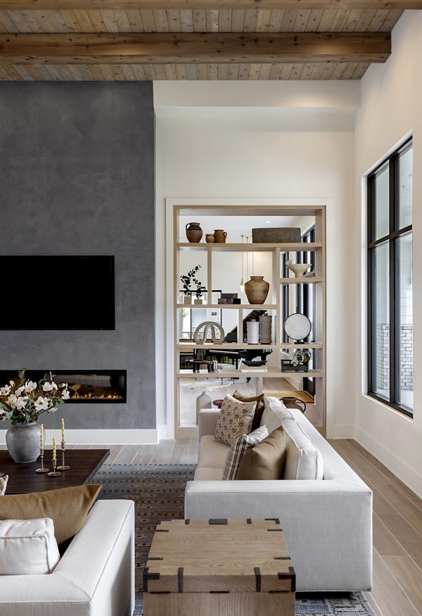 Contemporary clubhouse with lounge seating at Maxwell Apartments for social gatherings