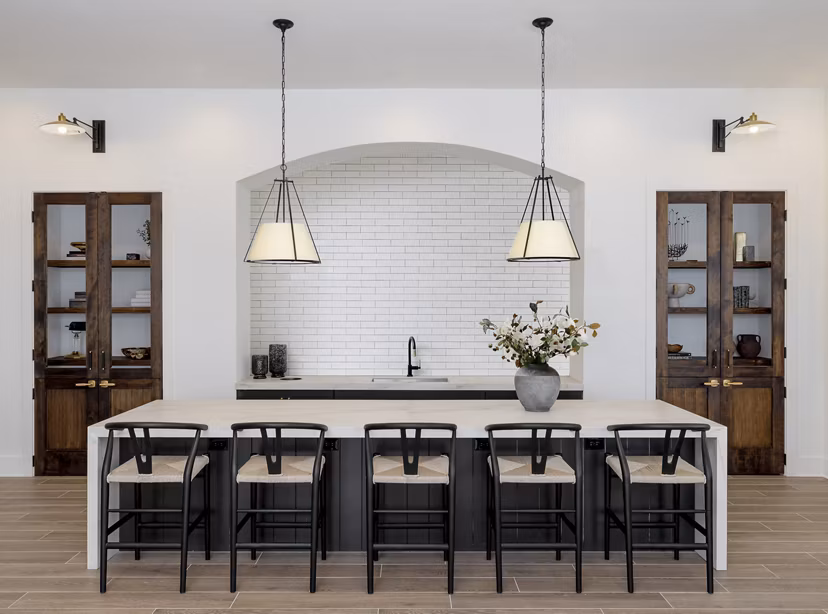 Maxwell Apartments: Modern clubhouse with luxurious seating and large windows in upscale residential community