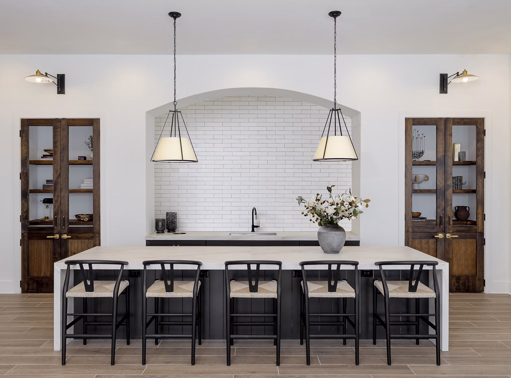 Maxwell Apartments: Modern clubhouse with luxurious seating and large windows in upscale residential community