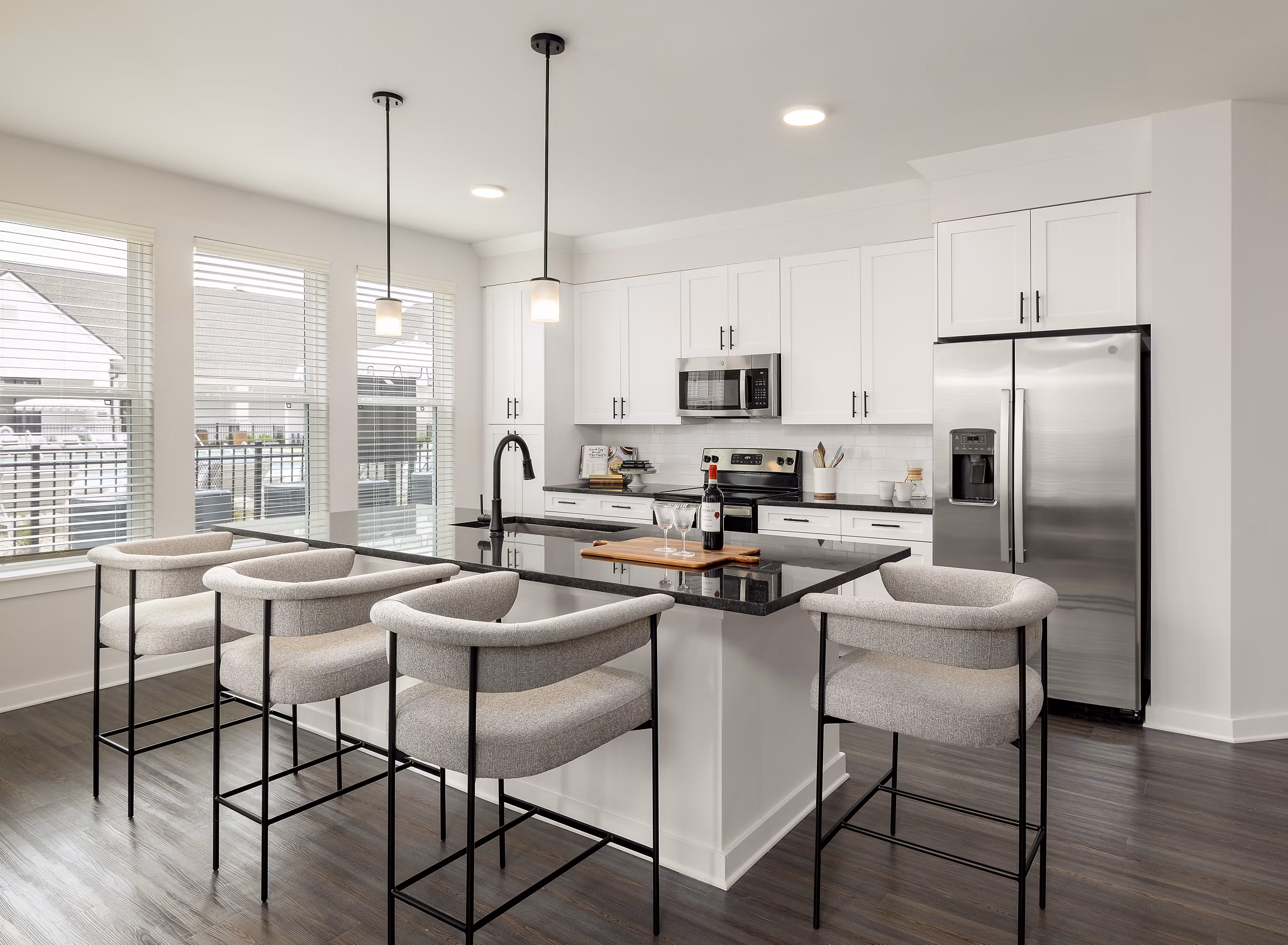 Sleek modern kitchen with stainless steel appliances at Maxwell Apartments