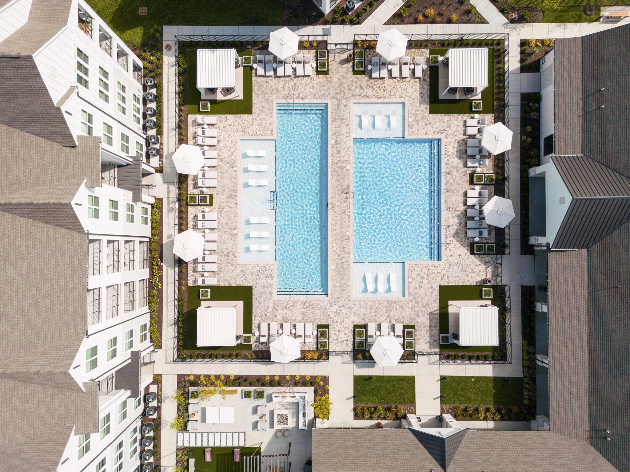 Maxwell Apartments: Stunning view of luxury high-rise apartments in a vibrant neighborhood