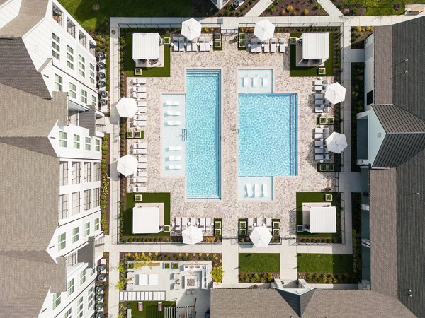 Maxwell Apartments: Stunning view of luxury high-rise apartments in a vibrant neighborhood