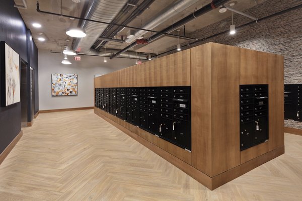 Mail room with package lockers at The Blake Apartments