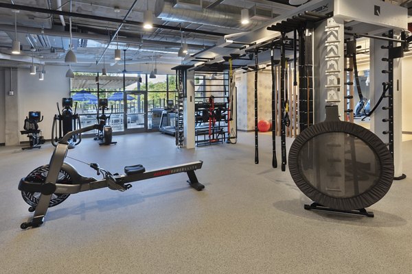 Fitness center with modern equipment at The Blake Apartments